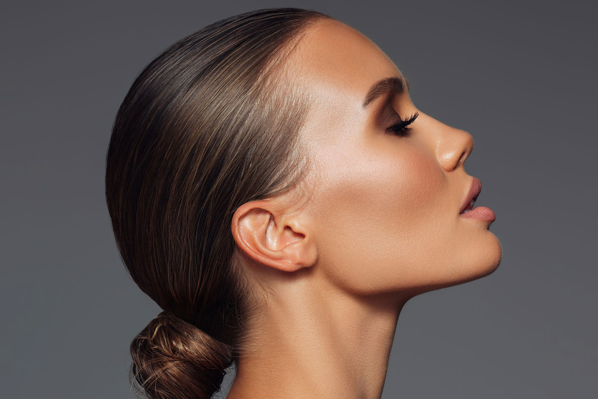 Profile of woman with chin implant in Naples